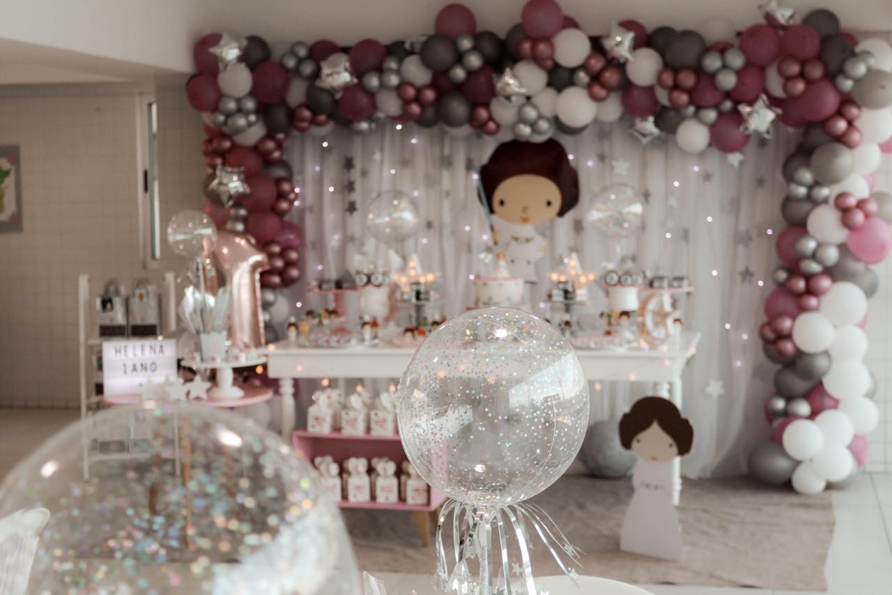 Crafting Captivating Headlines: Your awesome post title goes here A magical indoor birthday party setup featuring balloons, fairy lights, and themed decorations.
